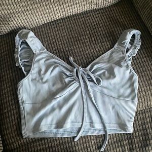 im selling a crop top/ tank top, thats a size L and blue!